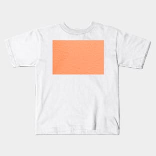 Closeup detail of orange leather texture background. Kids T-Shirt